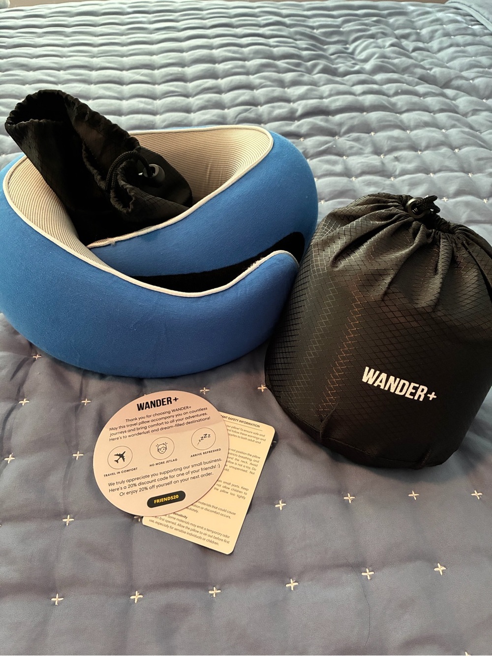 Wander Blue Travel Neck Pillow with Cream Lining and Black Carry Pouch